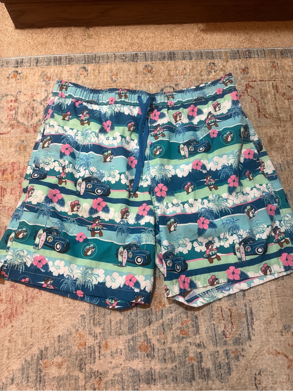 BUC-EE’S Turquoise Tropical Stripe Hybrid Swim Shorts